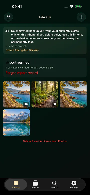 Velyr library with a grid of landscape photos, an import status and a backup reminder.